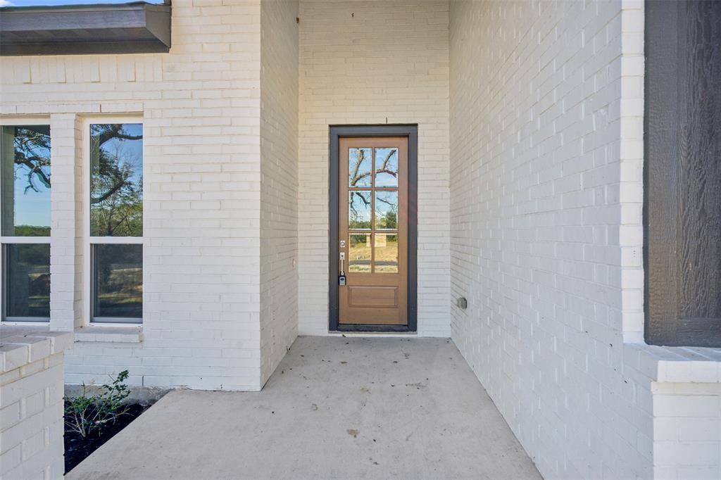 191 Lucky Ridge Lane Boyd, TX 76023 - Photo 6 of 38 a view of an empty room with window