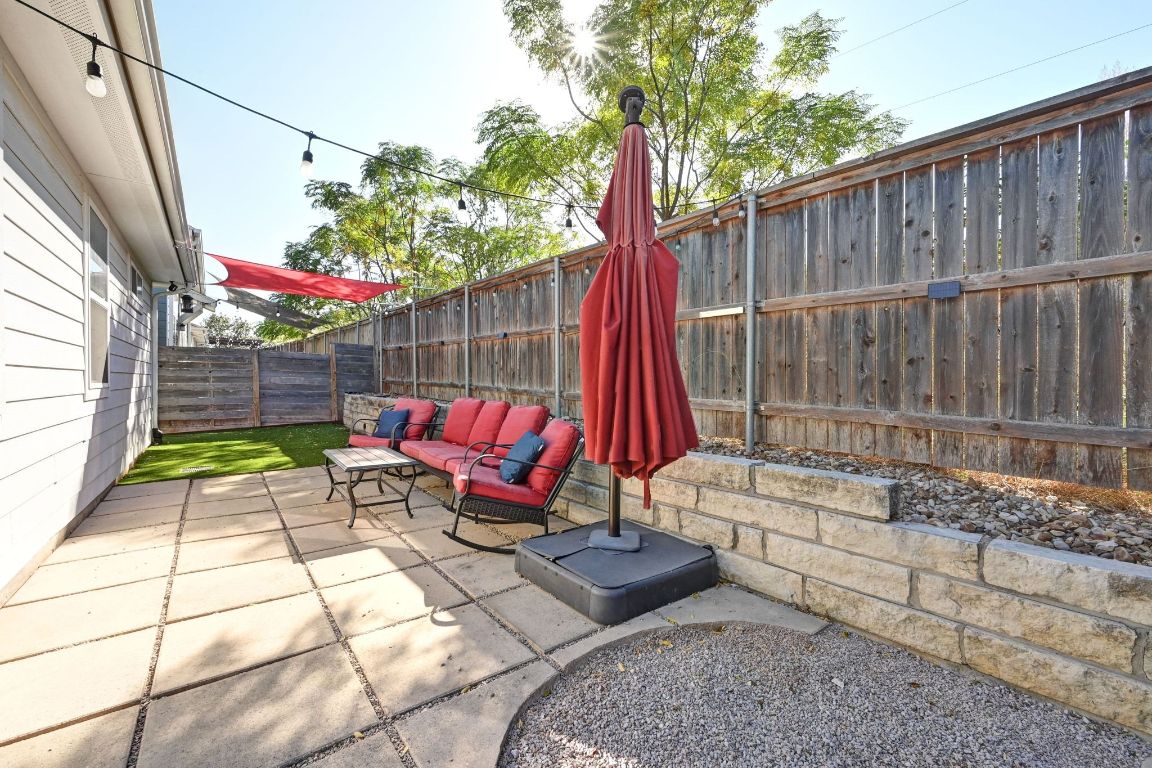 2108 Hermia Street Austin, TX 78741 - Photo 24 of 28 a view of outdoor space with seating area and trees around