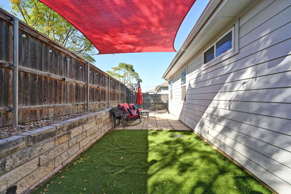 2108 Hermia Street Austin, TX 78741 - Photo 25 of 28 a view of yard with patio