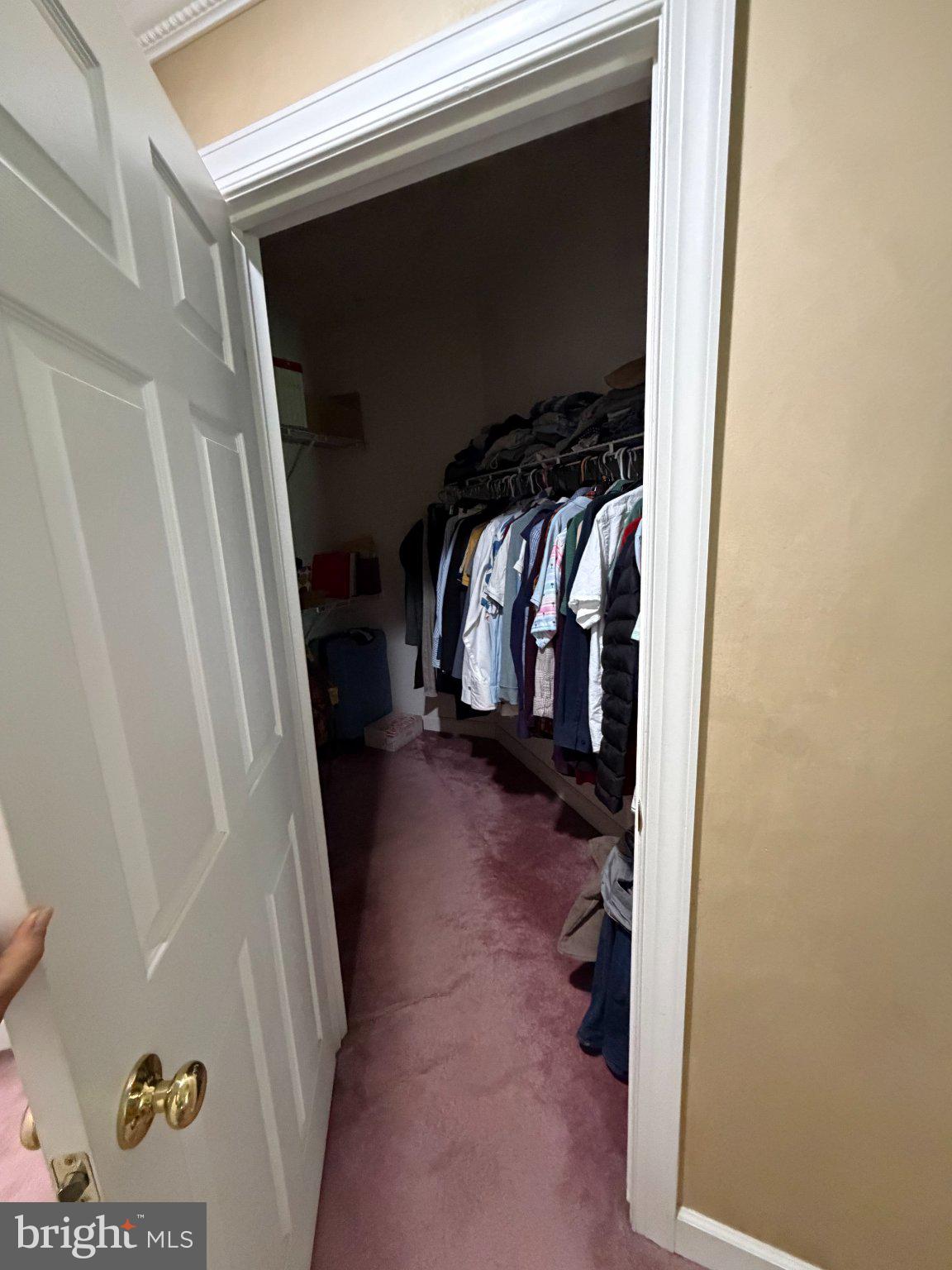 18724 Brooke Road Brinklow, MD 20862 - Photo 31 of 52 Spacious closet with organized attire.