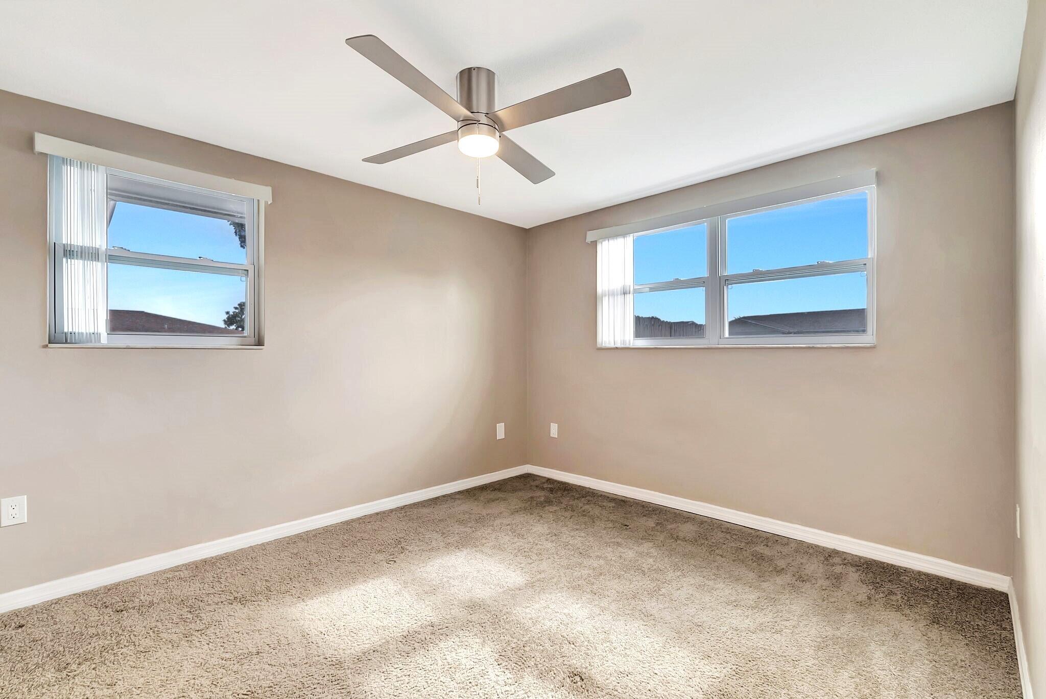 7611 Spirea Drive Port Richey, FL 34668 - Photo 12 of 17 Bedroom Two