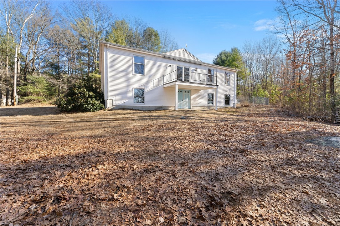 105 Nichols Road Burrillville, RI 02830 - Photo 1 of 17 Front Facing pond