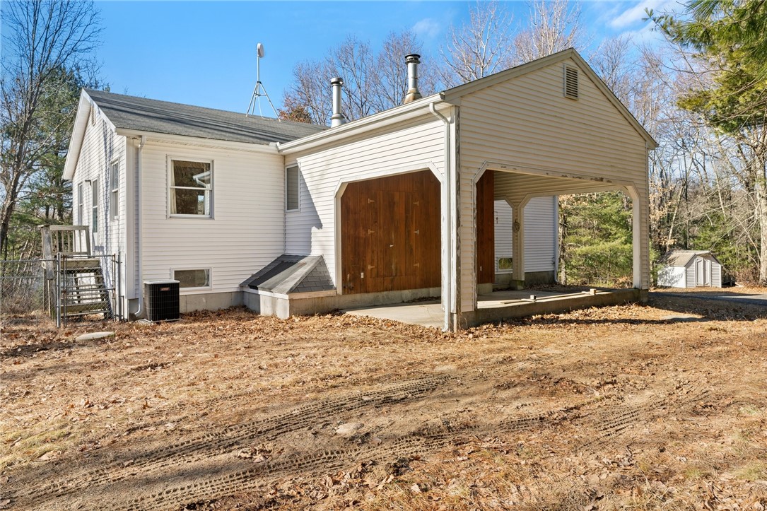 105 Nichols Road Burrillville, RI 02830 - Photo 2 of 17 Back with carport