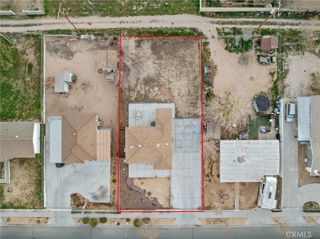 aerial view of a house with a garden