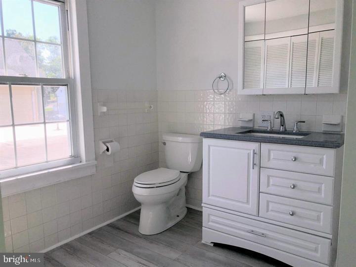 75 South Main Street Yardley, PA 19067 - Photo 20 of 29 a bathroom with a sink a toilet and a window
