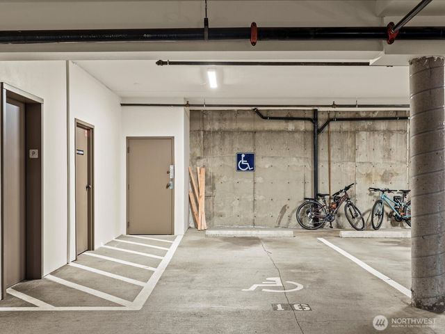 a view of a garage with table and chairs