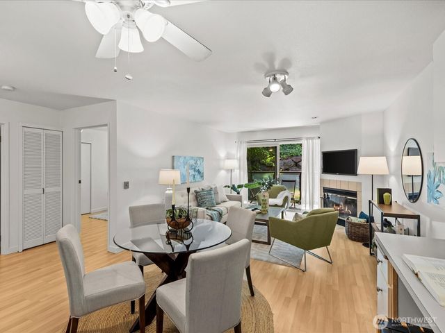 a view of a dining room with furniture window and outside view