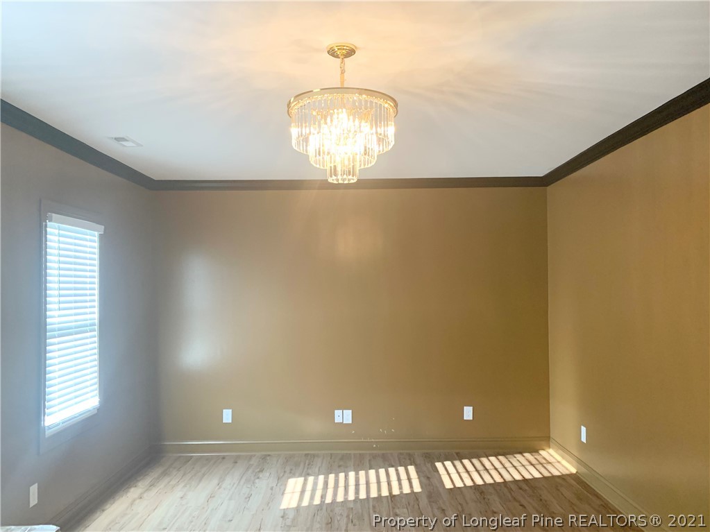 654 Townsend Road Raeford, NC 28376 - Photo 5 of 6 a view of an empty room with a window