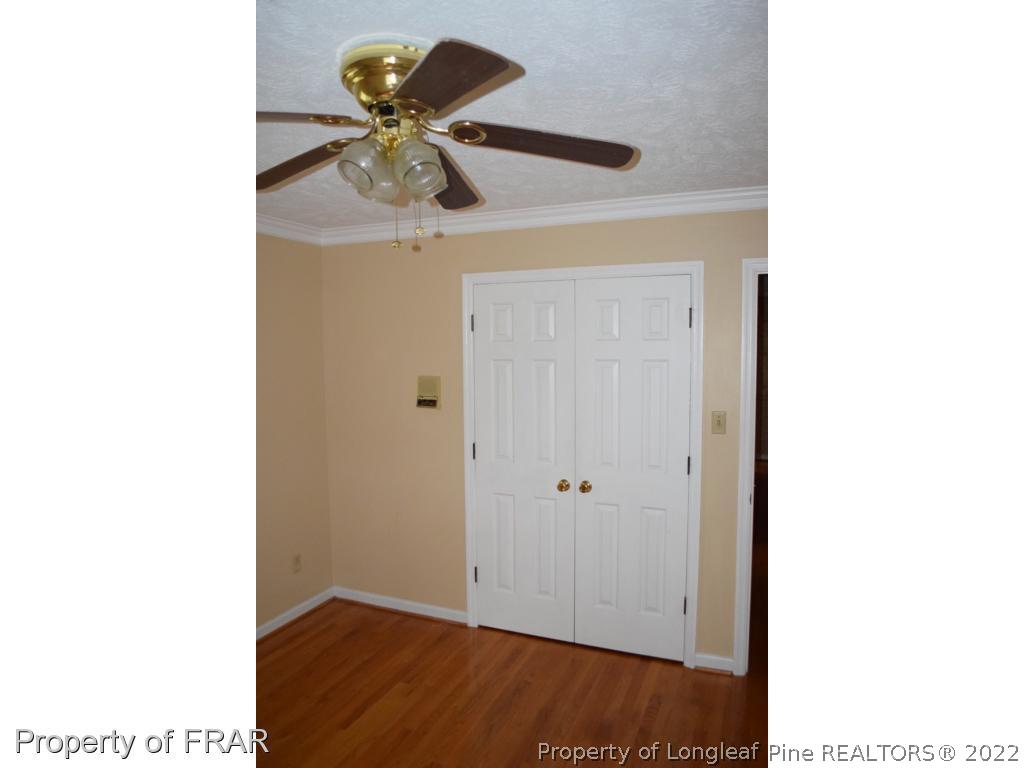 26861 Harold Morris Road Wagram, NC 28396 - Photo 12 of 24 a view of bathroom with a sink and a mirror