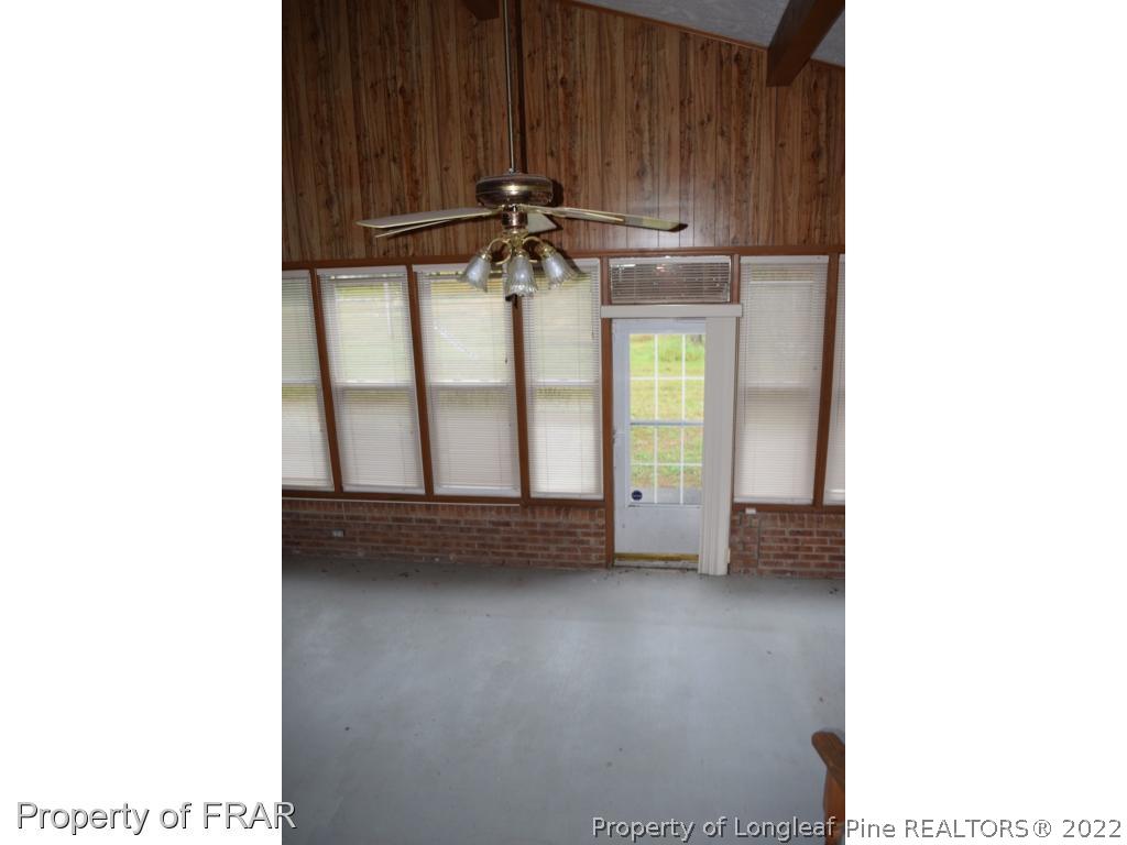 26861 Harold Morris Road Wagram, NC 28396 - Photo 18 of 24 a view of an empty room with a window