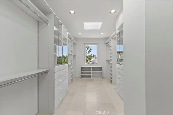 a view of kitchen with cabinets and wooden floor