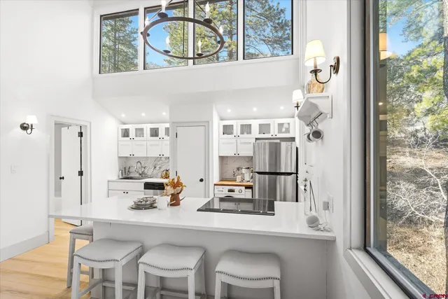 a bathroom with a sink and a window