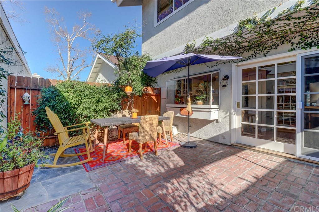 3 Sunflower, Unit 27 Irvine, CA 92604 - Photo 14 of 47 an outdoor sitting area with furniture and garden