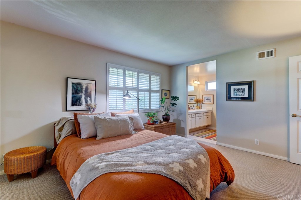 3 Sunflower, Unit 27 Irvine, CA 92604 - Photo 18 of 47 a bedroom with bed and window