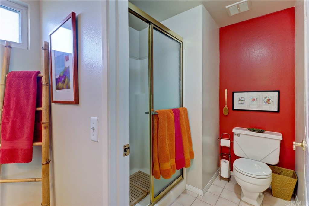3 Sunflower, Unit 27 Irvine, CA 92604 - Photo 20 of 47 a bathroom with a toilet and a shower