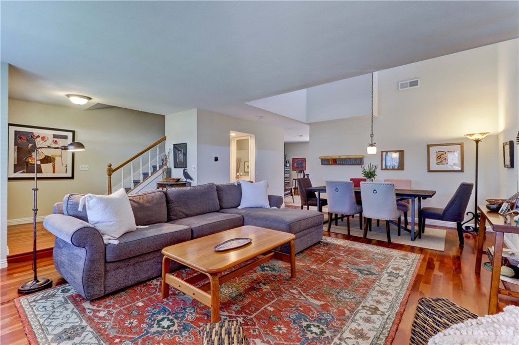 3 Sunflower, Unit 27 Irvine, CA 92604 - Photo 2 of 47 a living room with furniture a rug and a table
