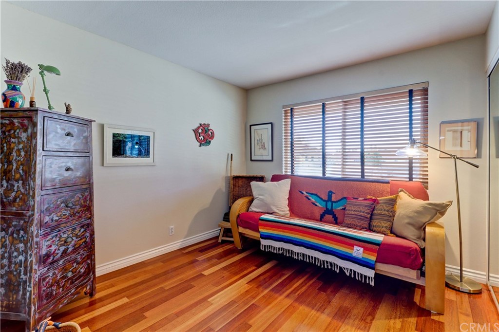 3 Sunflower, Unit 27 Irvine, CA 92604 - Photo 23 of 47 a living room with furniture and wooden floor