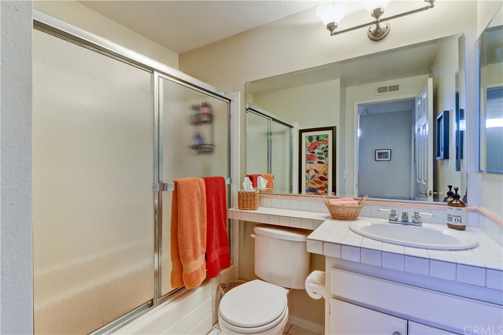 3 Sunflower, Unit 27 Irvine, CA 92604 - Photo 27 of 47 a bathroom with a sink toilet and shower
