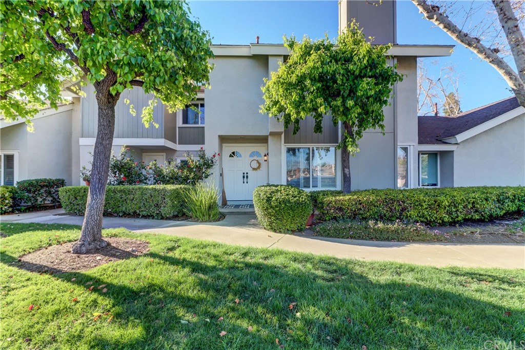 3 Sunflower, Unit 27 Irvine, CA 92604 - Photo 29 of 47 a view of a house with a yard and potted plants