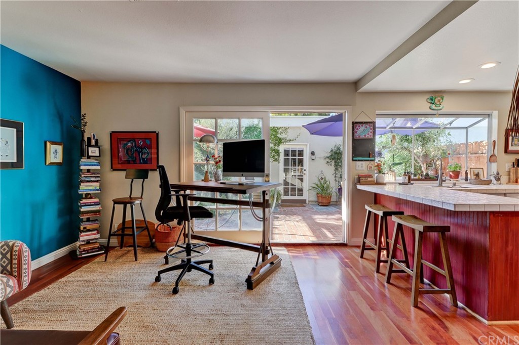 3 Sunflower, Unit 27 Irvine, CA 92604 - Photo 10 of 47 a view of a livingroom with furniture window and wooden floor