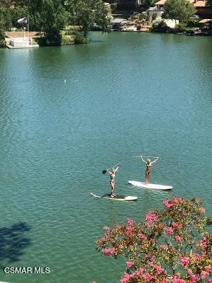 a view of a lake with a house