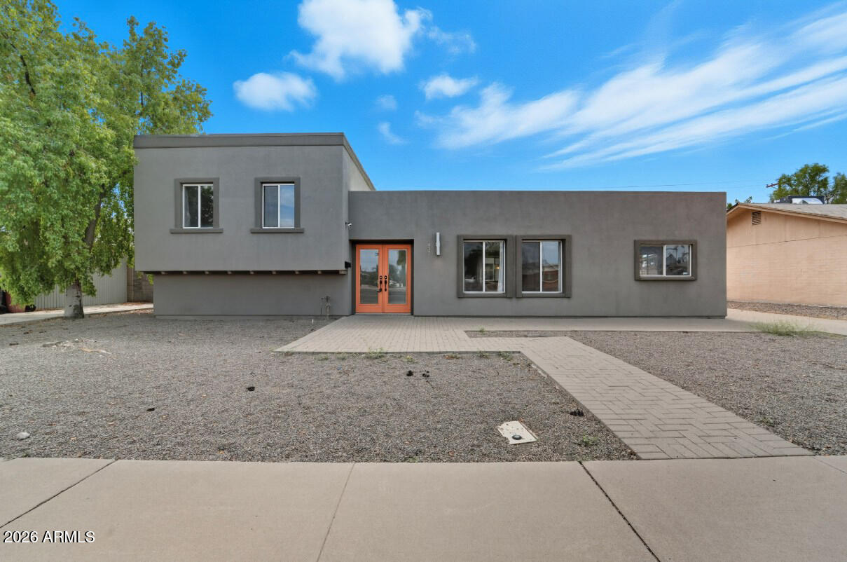 8437 East Thomas Road Scottsdale, AZ 85251 - Photo 2 of 55 a view of a house with a backyard