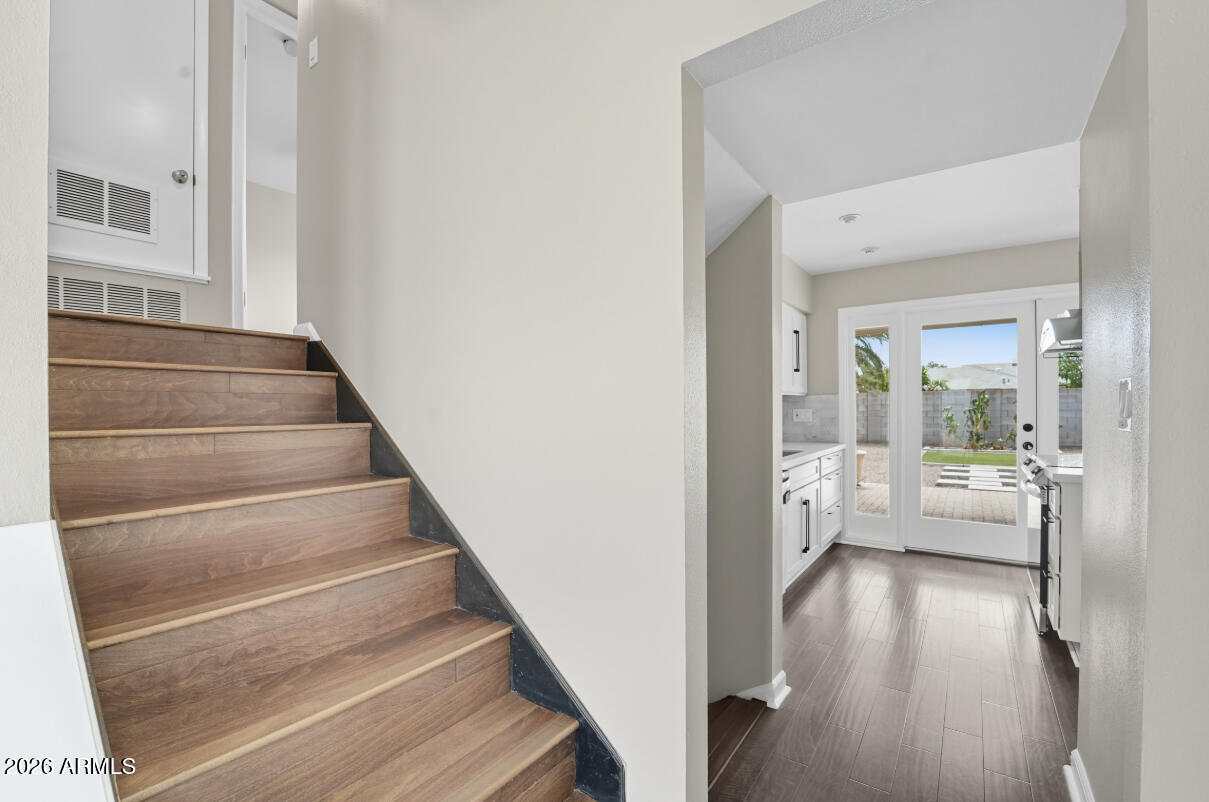8437 East Thomas Road Scottsdale, AZ 85251 - Photo 32 of 55 a view of entryway and hall with wooden floor