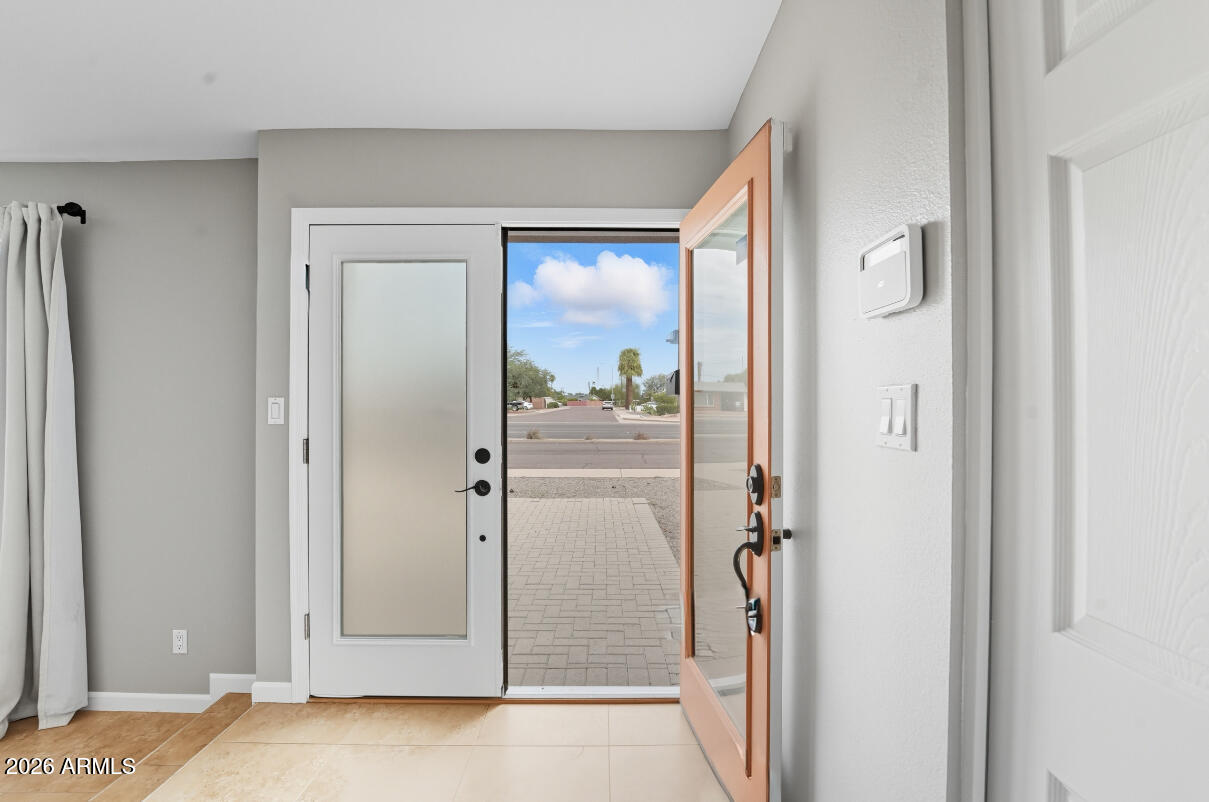 8437 East Thomas Road Scottsdale, AZ 85251 - Photo 6 of 55 a view of a bathroom with a glass door