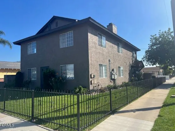 a front view of a house having yard