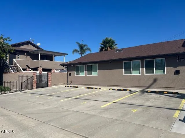 a view of the house with roof deck