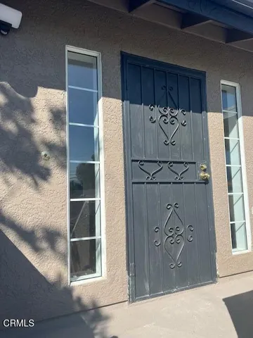 a white refrigerator freezer sitting inside of a kitchen