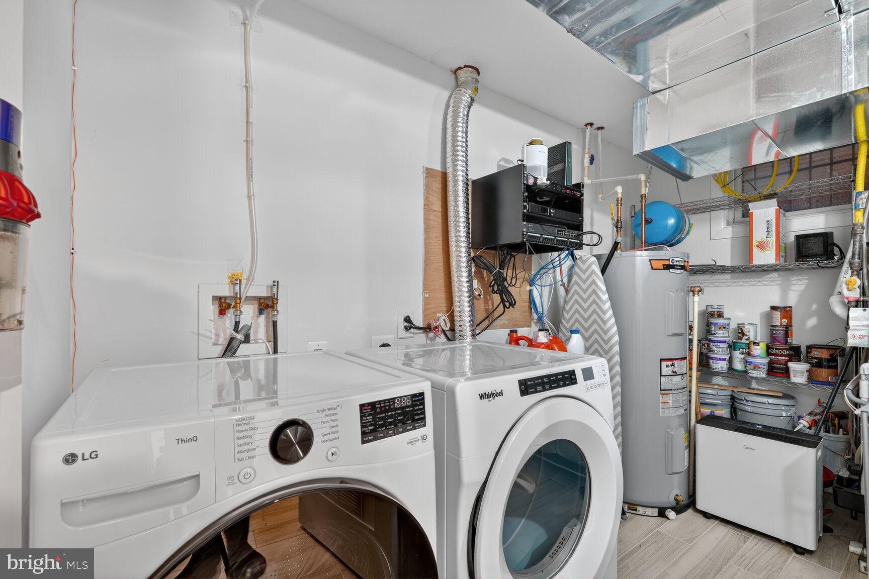 5908 17th Street Northwest Washington, DC 20011 - Photo 23 of 30 a view of storage and utility room with washer and dryer