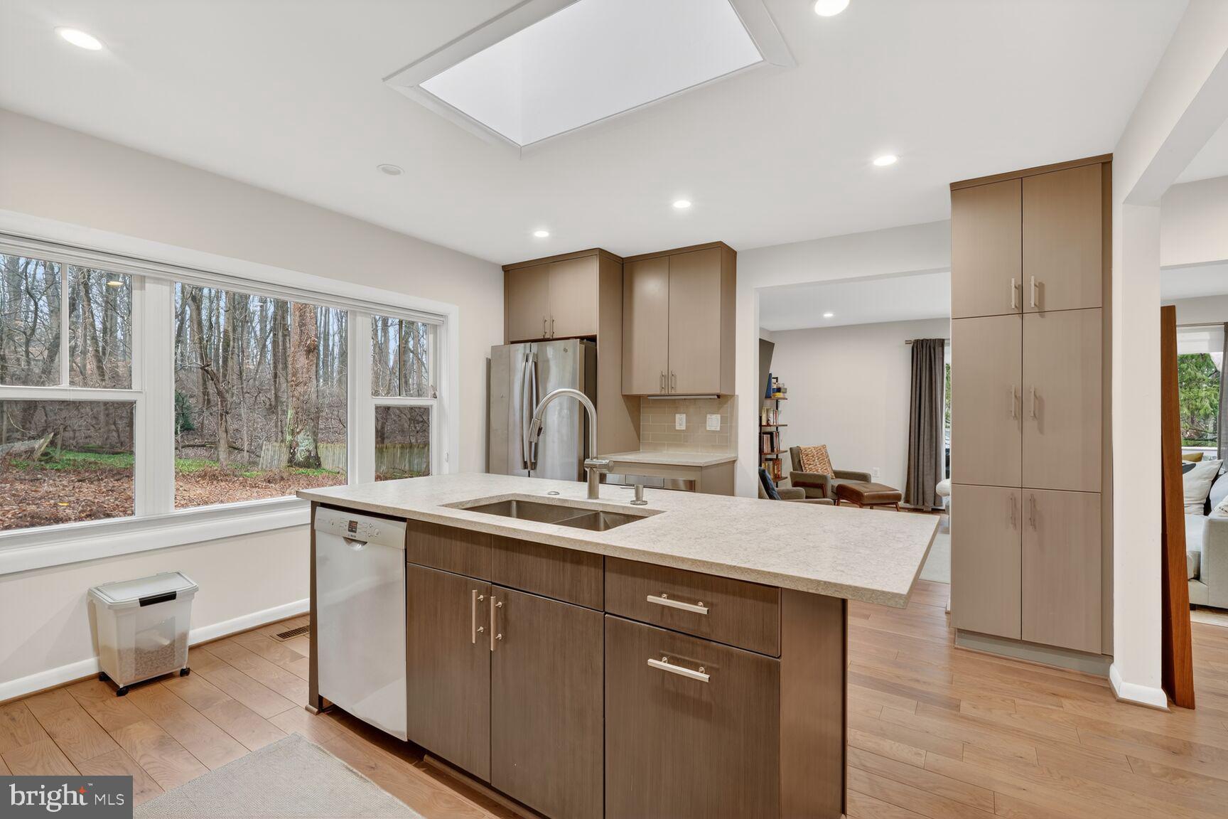 5908 17th Street Northwest Washington, DC 20011 - Photo 5 of 30 a kitchen with a sink and a refrigerator