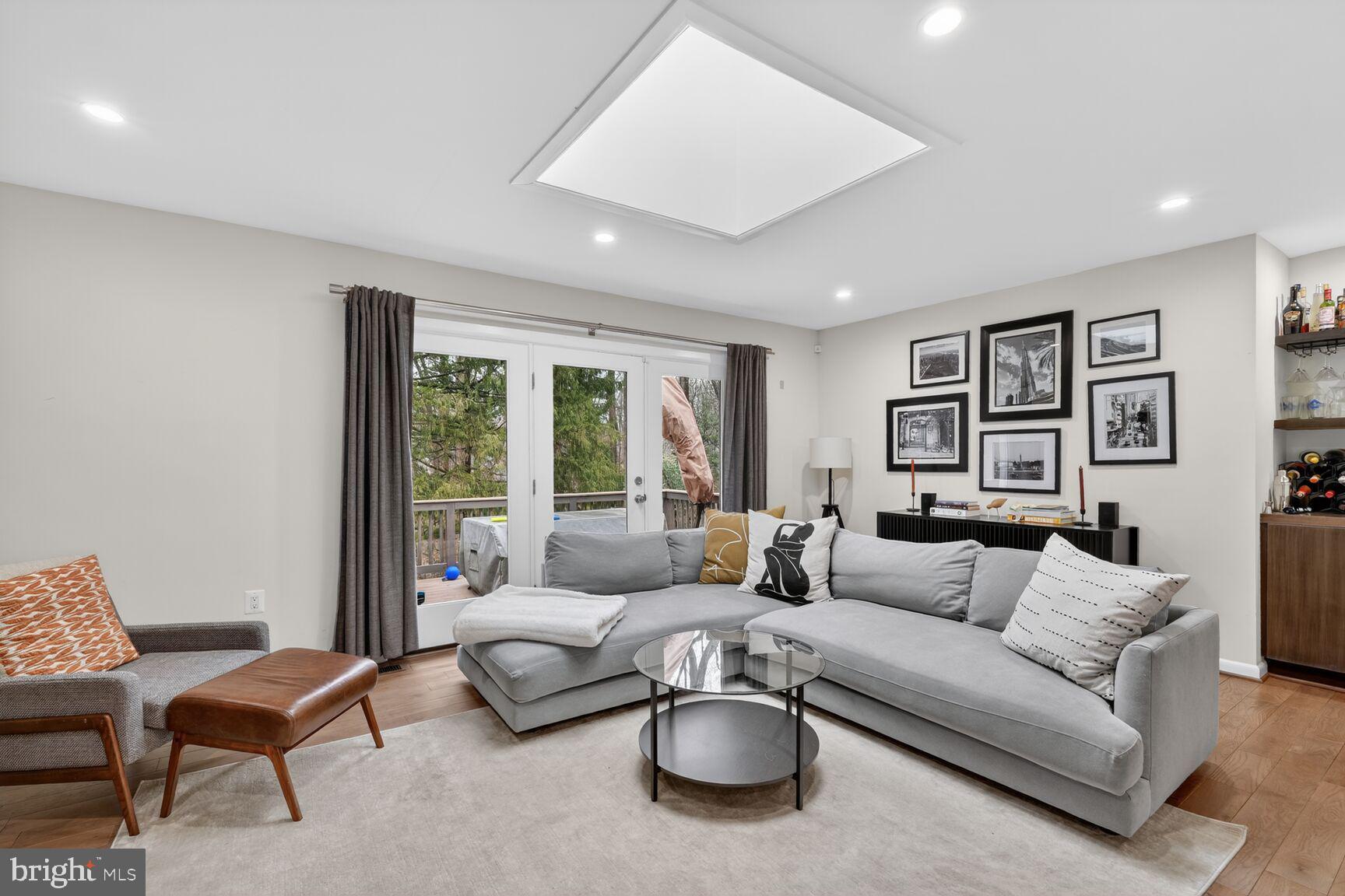 5908 17th Street Northwest Washington, DC 20011 - Photo 9 of 30 a living room with furniture and a large window