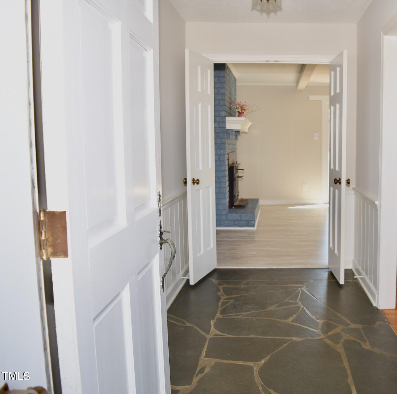 1804 Wall Hill Road Raleigh, NC 27604 - Photo 8 of 24 Slate floors leading to great room. Formal living room is to the right.