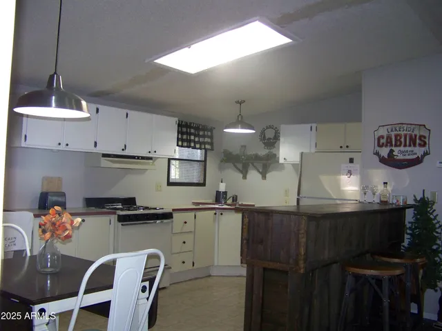 a bedroom with a bed and a mirror