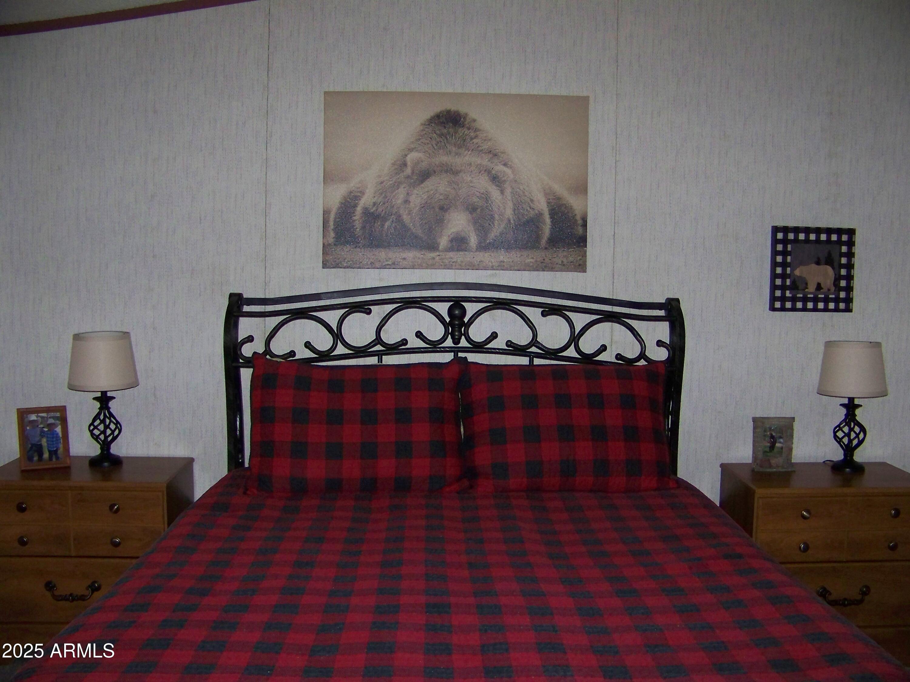 1167 White Tail Lane Pinetop, AZ 85935 - Photo 19 of 58 a view of a bedroom with a bed and furniture