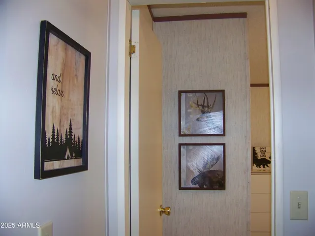 a bathroom with a toilet and a sink