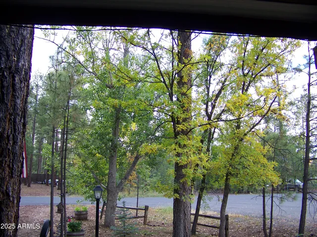 a living room with couch and a flat screen tv