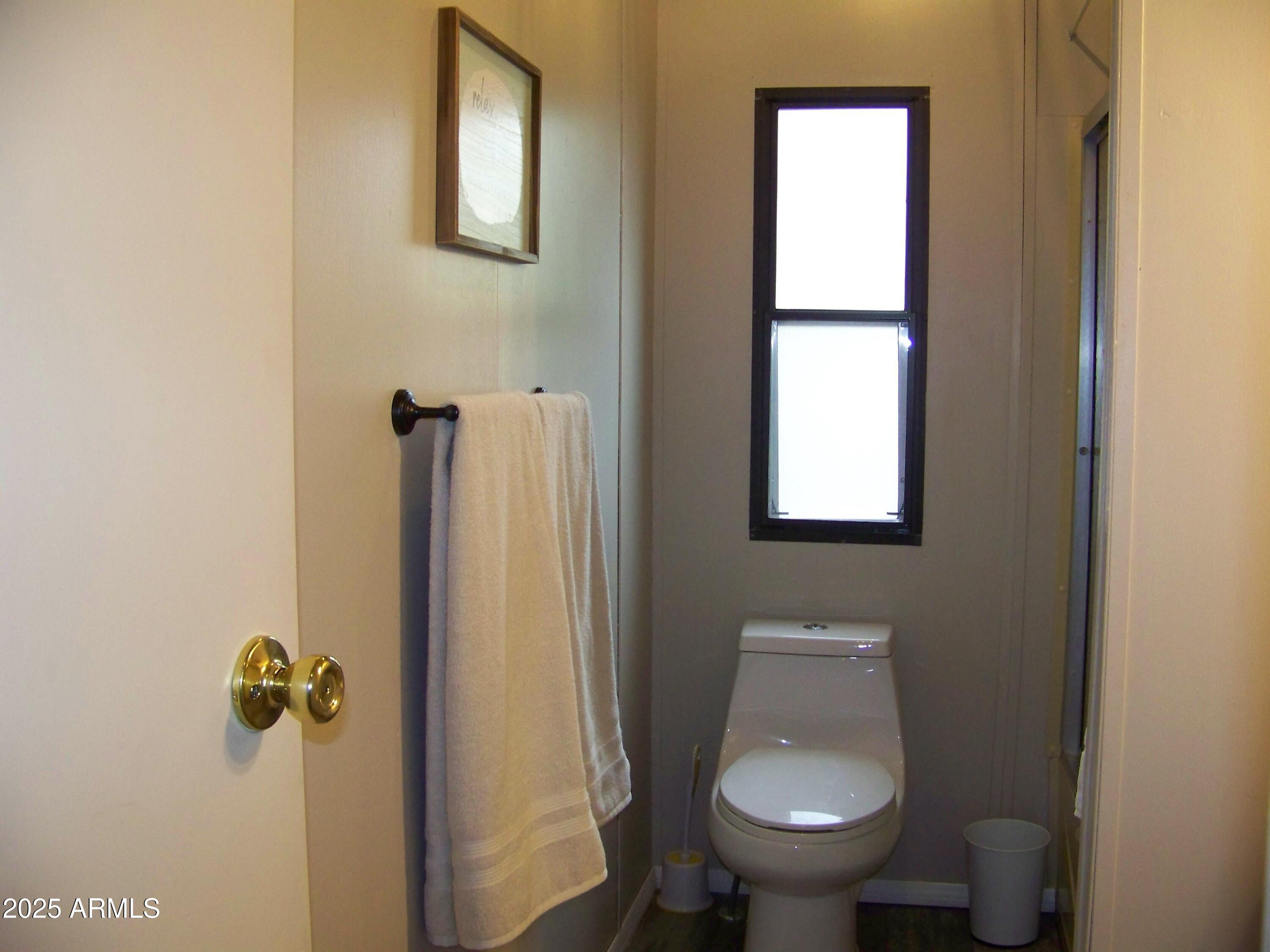 1167 White Tail Lane Pinetop, AZ 85935 - Photo 33 of 58 a bathroom with a toilet and a sink
