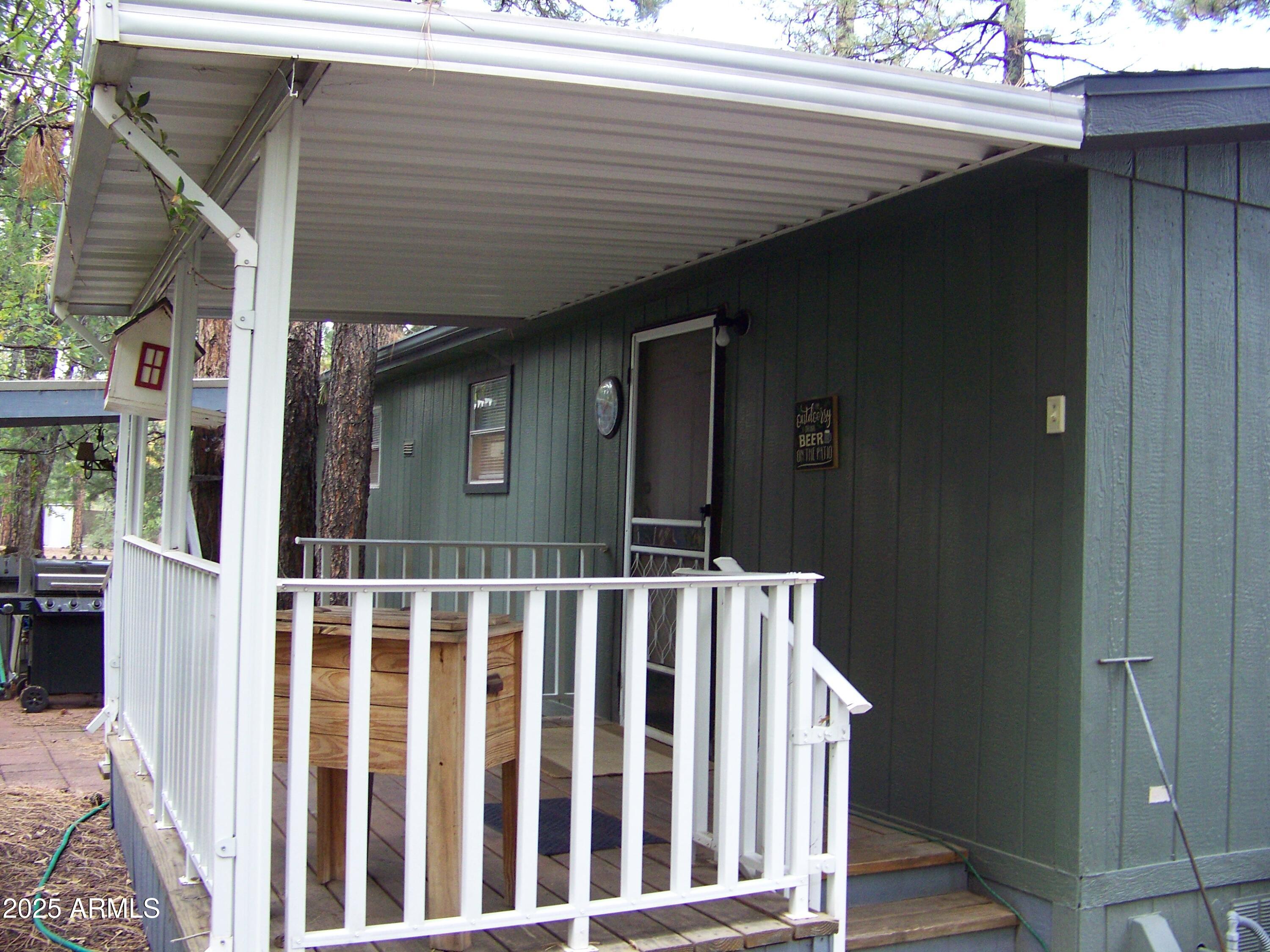1167 White Tail Lane Pinetop, AZ 85935 - Photo 36 of 58 a view of a house with a deck