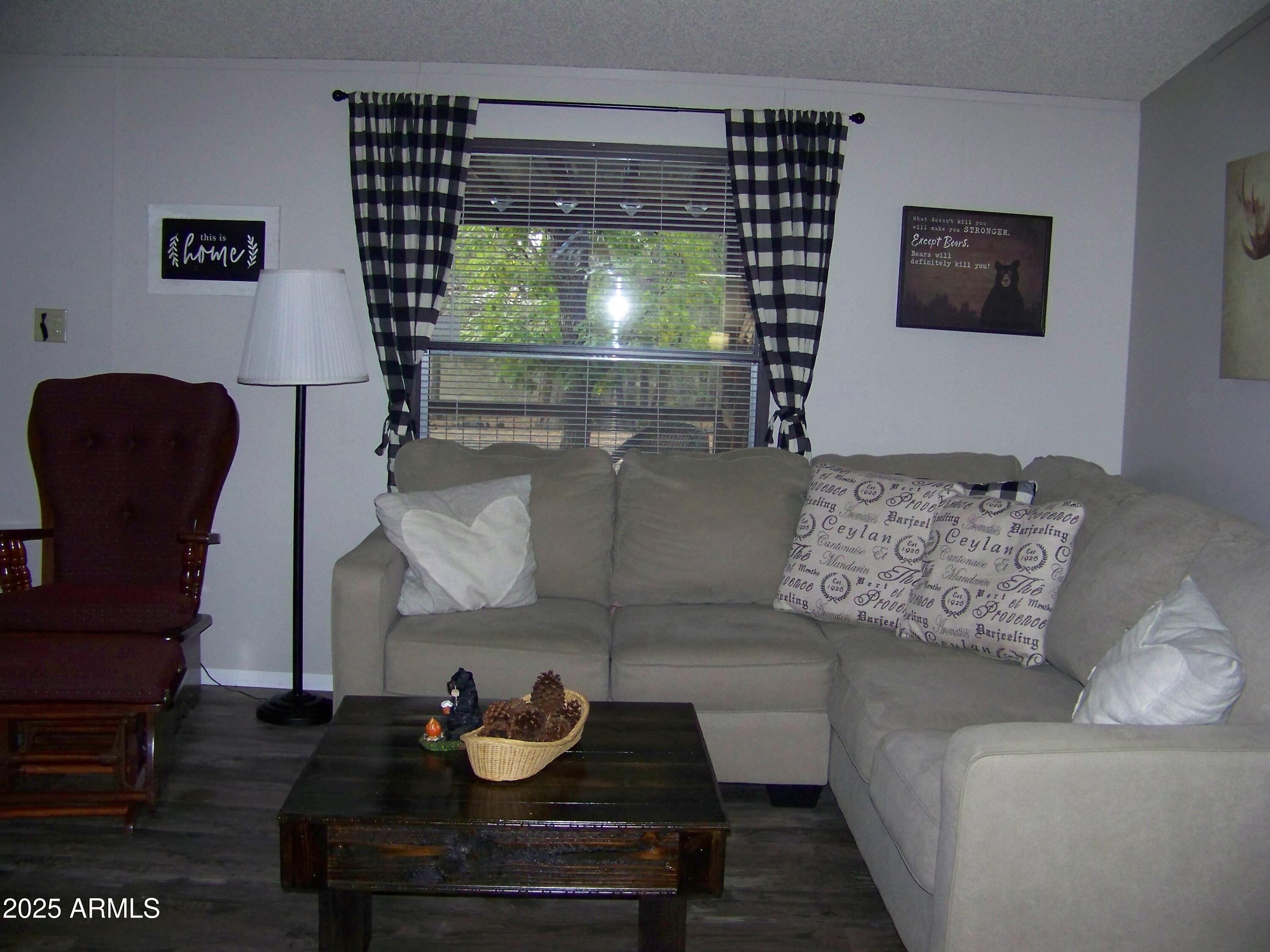 1167 White Tail Lane Pinetop, AZ 85935 - Photo 10 of 58 a living room with furniture and a flat screen tv