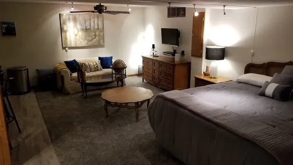 a dinning table and chairs in a room