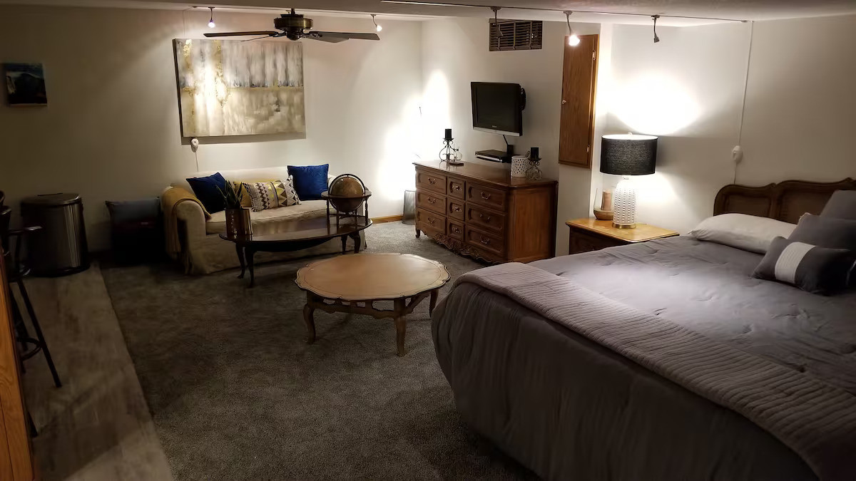 4 Forest Knolls Decatur, IL 62521 - Photo 17 of 32 a bedroom with a bed and a couch