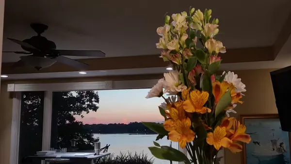 a vase of flowers sitting on a table