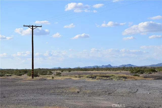 a view of a road with an ocean view