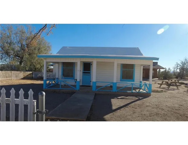 a black and white photo of a house