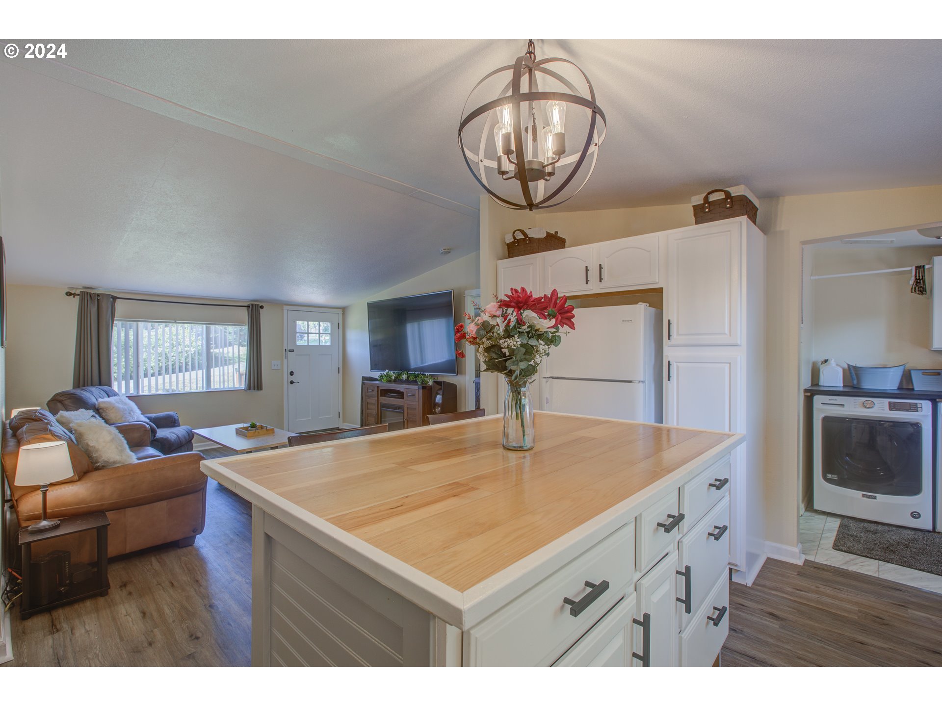 929 Northeast Rifle Range Street Roseburg, OR 97470 - Photo 12 of 48 a room with furniture and chandelier
