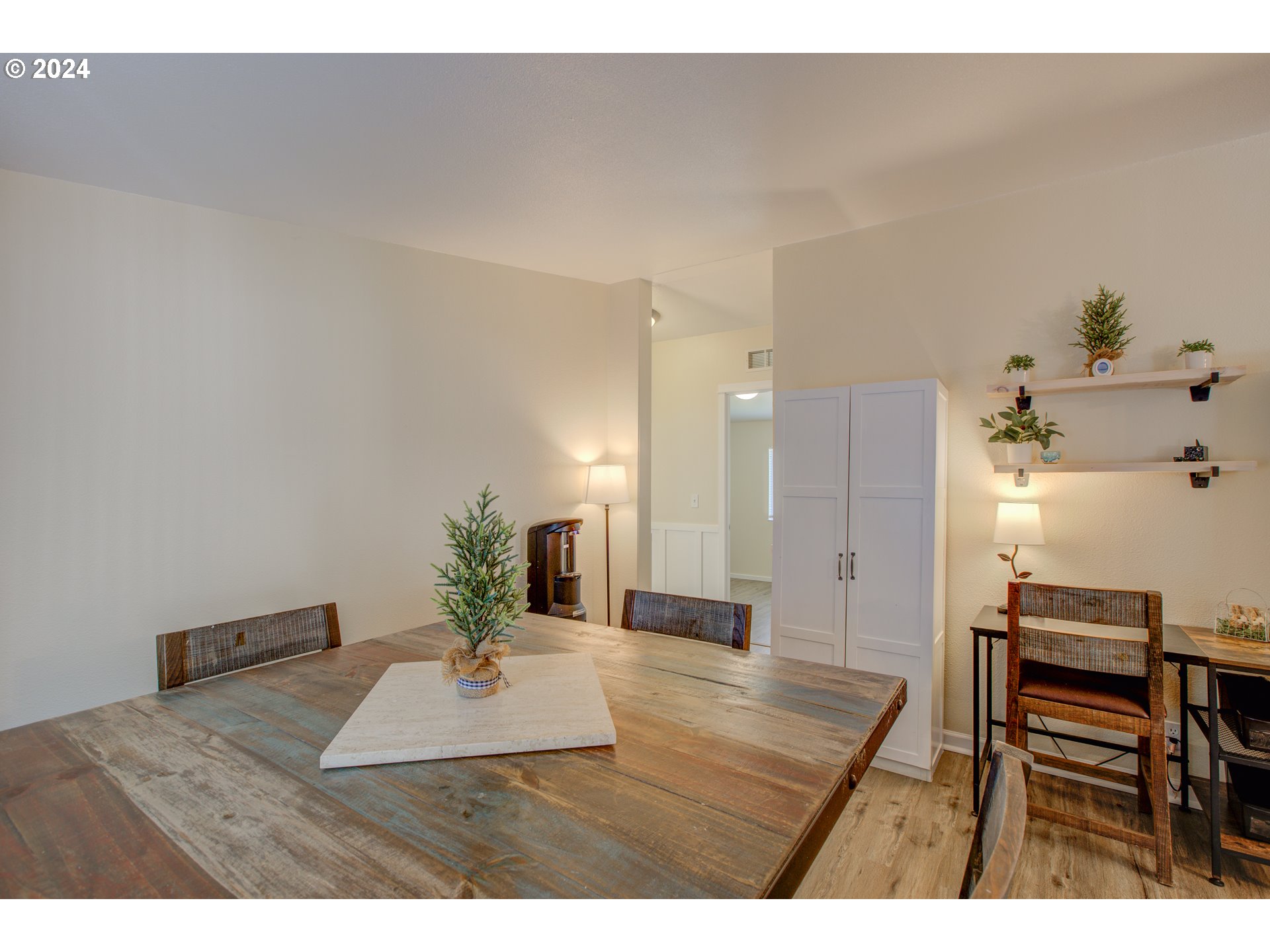 929 Northeast Rifle Range Street Roseburg, OR 97470 - Photo 16 of 48 a living room with furniture and wooden floor
