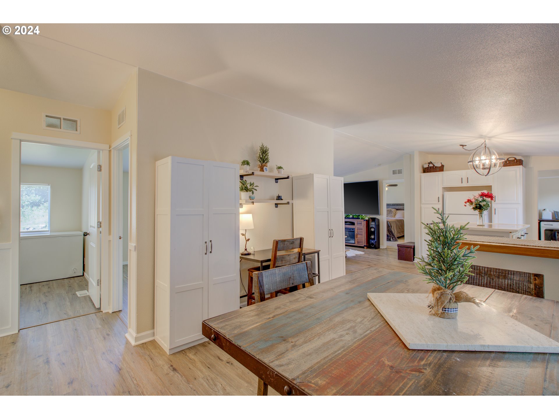 929 Northeast Rifle Range Street Roseburg, OR 97470 - Photo 17 of 48 a living room with furniture and a wooden floor